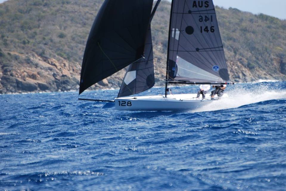 May be an image of 4 people, people boat racing, sail, sailing boat and text